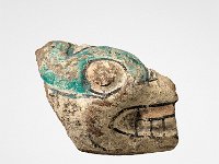 Ame Ker 99  Ame Ker 99, Mexiko, Bundesstaaten Oaxaca und Puebla, Mixteken, Azteken (?), Postklassische Periode, Monte Albán V, ca. 1100-1521 n. Chr., Fragment einer Figur, Ton, H 3,6 cm, L 4,5 cm : Museumsfoto: Claus Cordes, Bestandskatalog Ethnologie